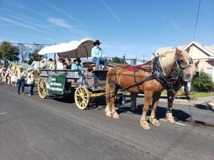 Wagon being pulled by two horses.